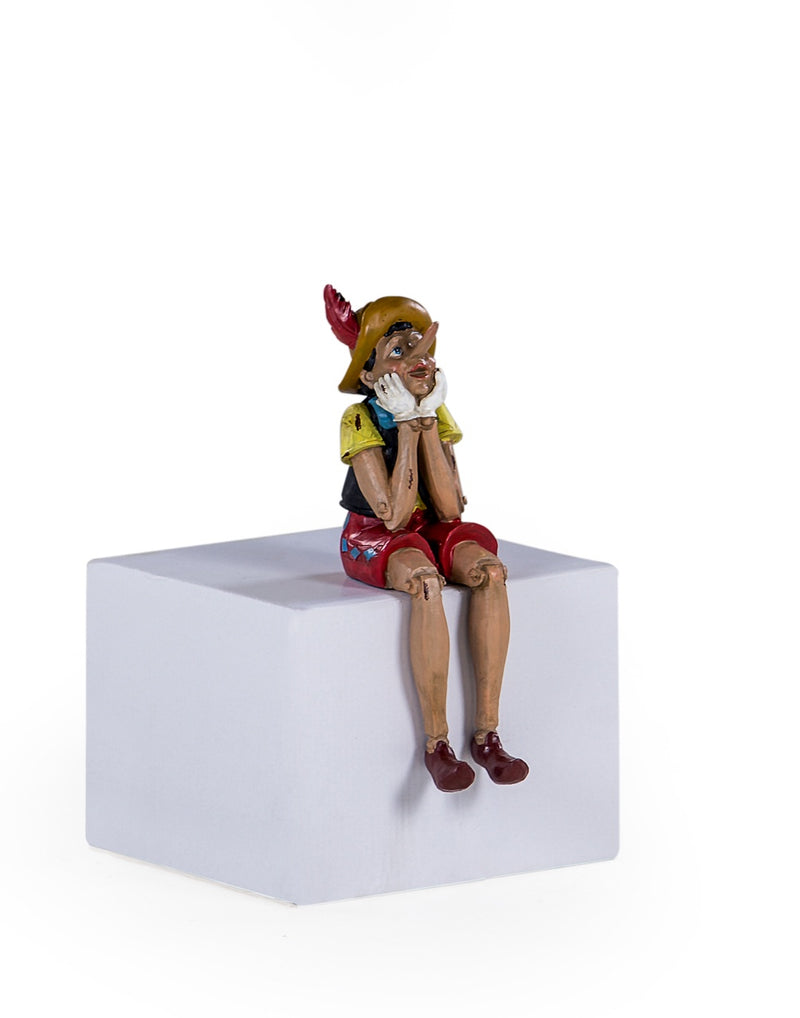 Antiqued Sitting Pinocchio Figure - Meadow Lane Ardee